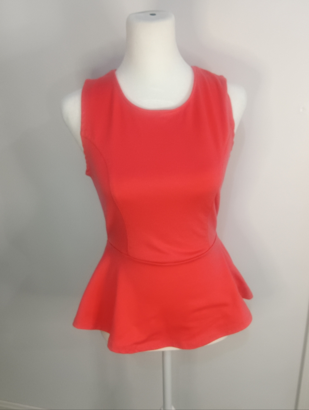 Sleeveless Dark Salmon Peplum Top